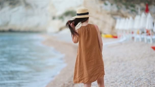 Young beautiful woman on white tropical beach. — Stock Video