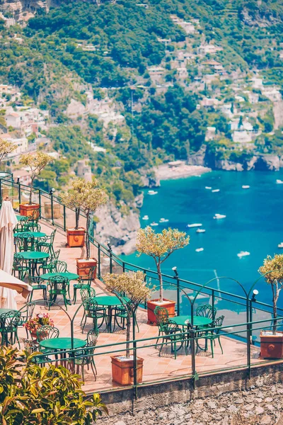 Summer empty outdoor cafe in a tourist place in Italy — Stock Photo, Image