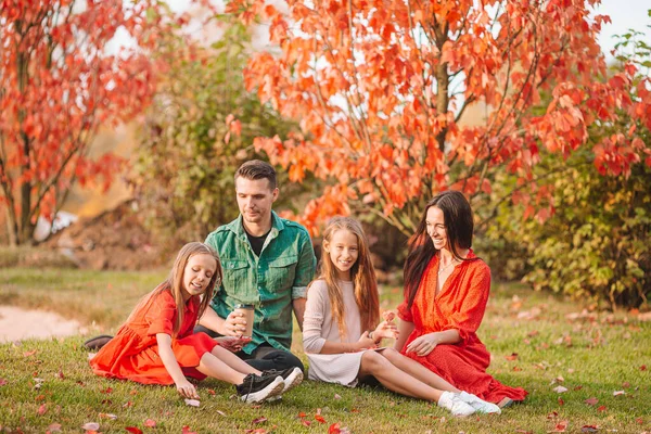 Portrait of happy family of four in autumn — Stock Photo, Image