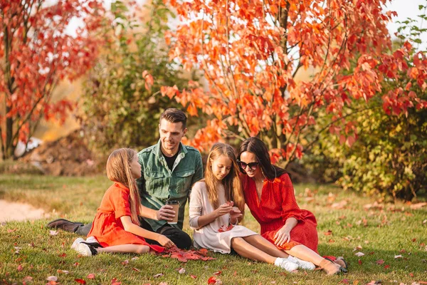 Portrait of happy family of four in autumn day — Stock Photo, Image