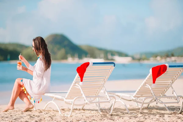 Young woman with tasty cocktail on summer vacation — Stock Photo, Image