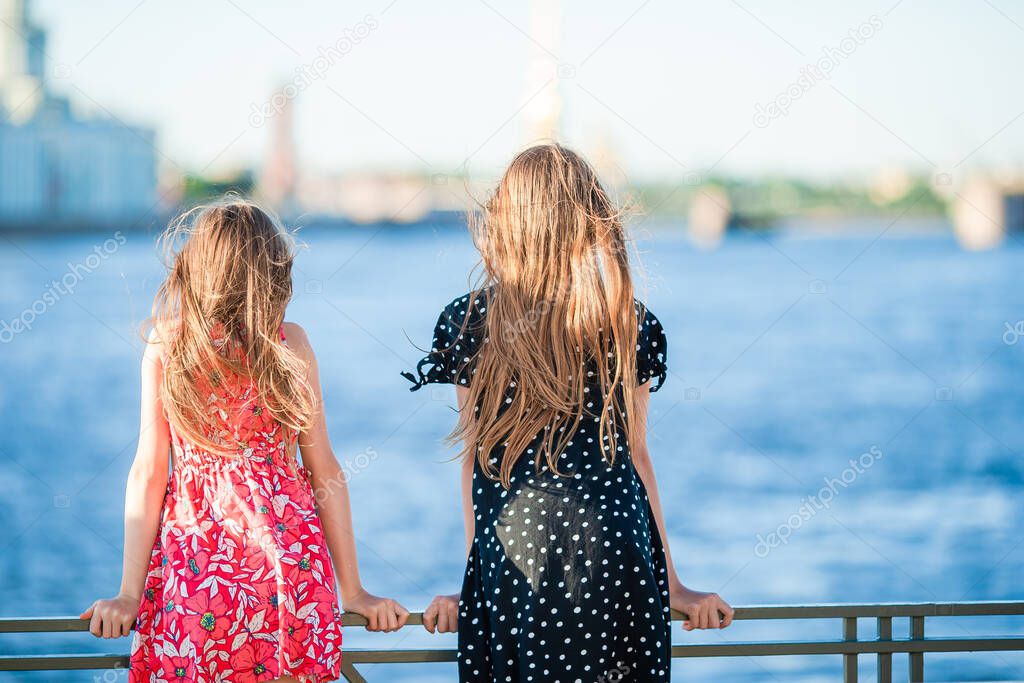 Children at the summer waterfront in Saint Petersburg