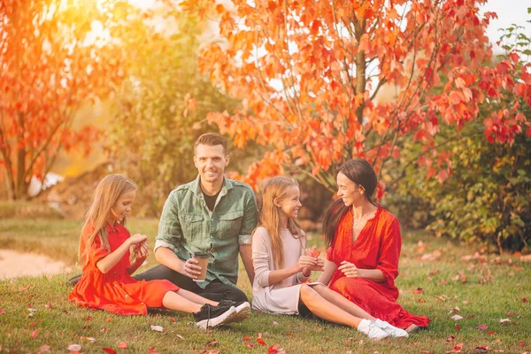 Portrait of happy family of four in autumn day — Stock Photo, Image