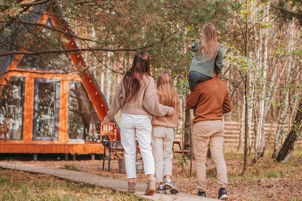 Beautiful family walking at autumn warm day — Stock Photo, Image