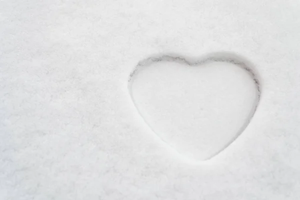 Eine Große Weiße Herzform Schnee Februar Konzept lizenzfreie Stockfotos