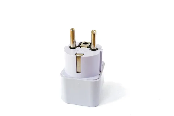 Stock image EU white plug, with an earth connection, isolated on white background. USA, EU, UK, Australia Europlug adapter with the pins pointing up.