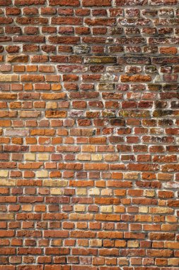 Dikey kırmızı tuğla duvar eski