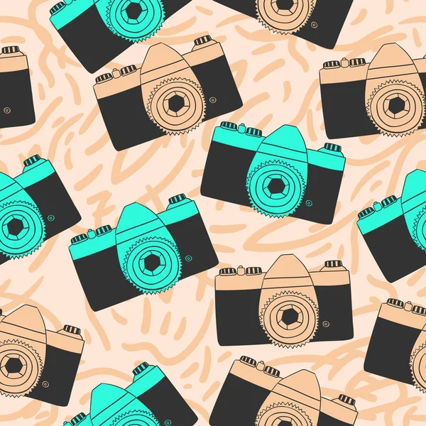 Seamless pattern with old photo cameras in doodle style. — Stock Vector