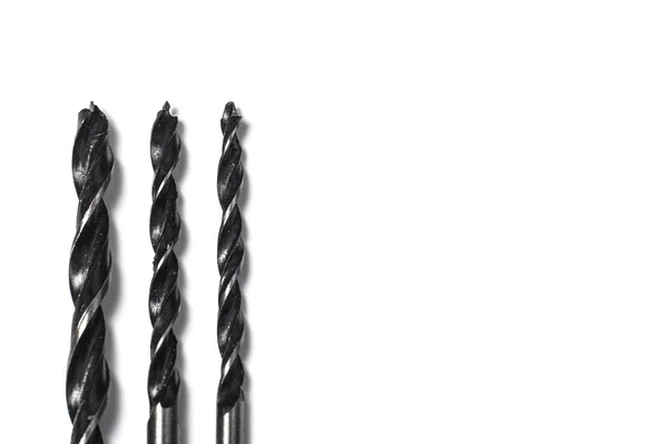 Three Drill bits for drills isolated on white background — Stock Photo, Image