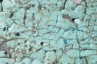 ahşap bir yüzey üzerinde eski mavi boya, tahta üzerinde çatlak boya