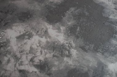 Yapay betonla dekore edilmiş alçının arka planı. Duvarda kurumuş alçı..