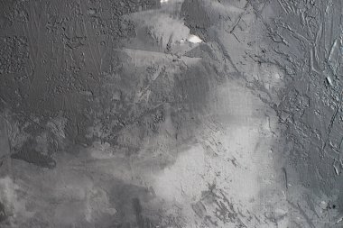 Yapay betonla dekore edilmiş alçının arka planı. Duvarda kurumuş alçı..