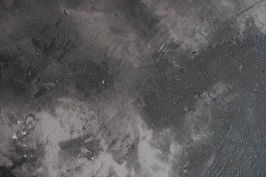 Yapay betonla dekore edilmiş alçının arka planı. Duvarda kurumuş alçı..