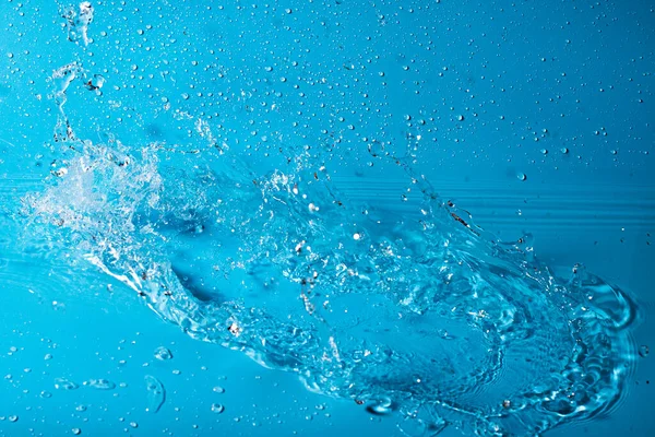 Wasserspritzer Auf Blauem Hintergrund Abstrakte Tapete — Stockfoto