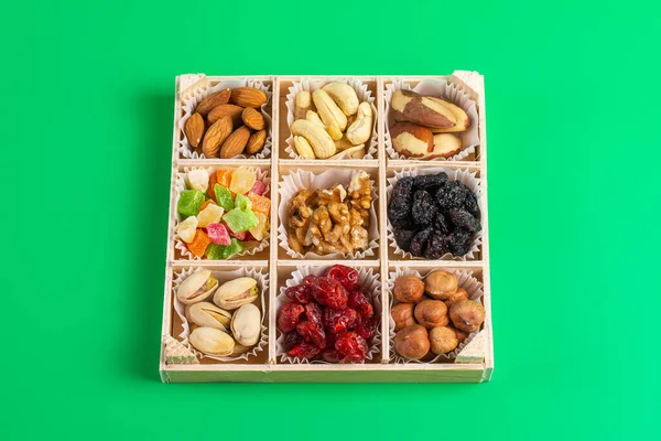 Assorted Dried Fruits Nuts Wooden Box Isolated Green Background Raisins — Stock Photo, Image