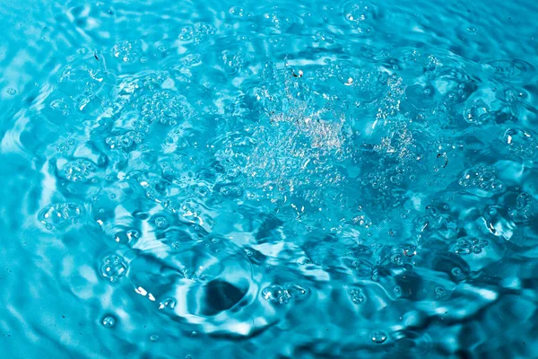 Wasserspritzer Auf Blauem Hintergrund Abstrakte Tapete — Stockfoto