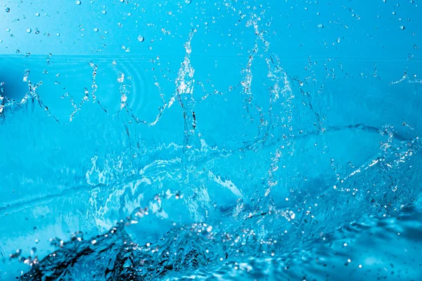 Wasserspritzer Auf Blauem Hintergrund Abstrakte Tapete — Stockfoto