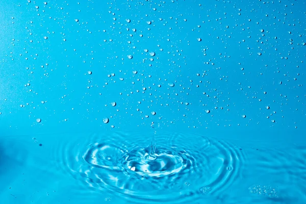 Respingo Água Sobre Fundo Azul Papel Parede Abstrato — Fotografia de Stock