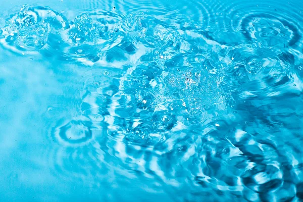 Respingo Água Sobre Fundo Azul Papel Parede Abstrato — Fotografia de Stock