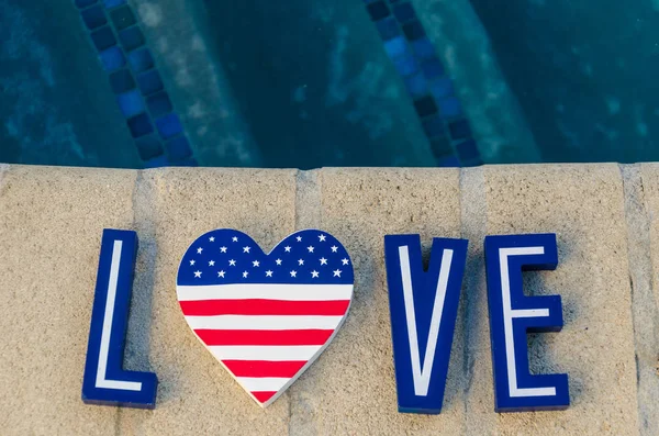 Patriotic USA background with decorations near the swimming pool