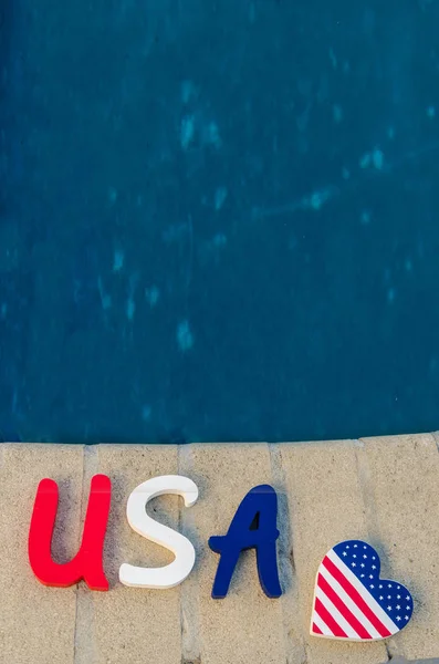 Patriotic USA background with decorations near the swimming pool