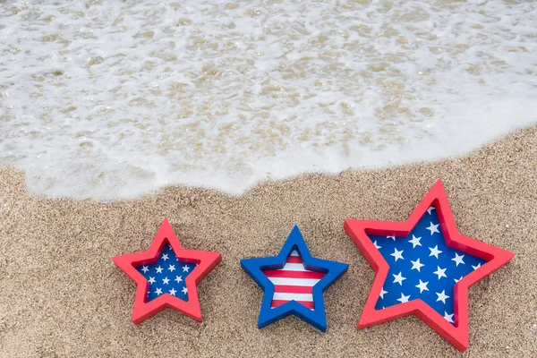 Fondo patriótico de EE.UU. en la playa de arena — Foto de Stock