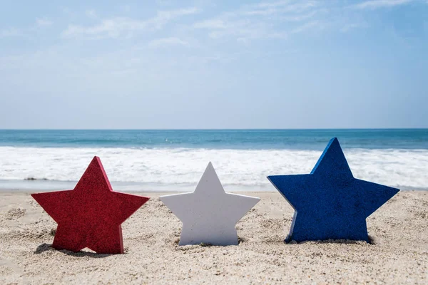 Fondo patriótico de EE.UU. en la playa de arena — Foto de Stock