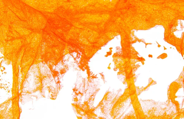 Art kéz ecset fröccsenő narancs színű fehér háttér. — Stock Fotó