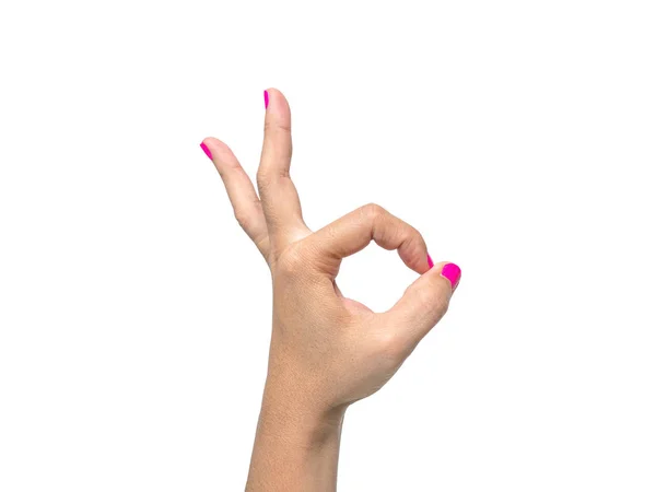 Primer plano de la mano de una mujer que muestra signo OK con un clavo rosa poli —  Fotos de Stock
