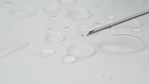 Drops Water Medical Equipment Syringe Needle White Background Selective Focus — Stock Video