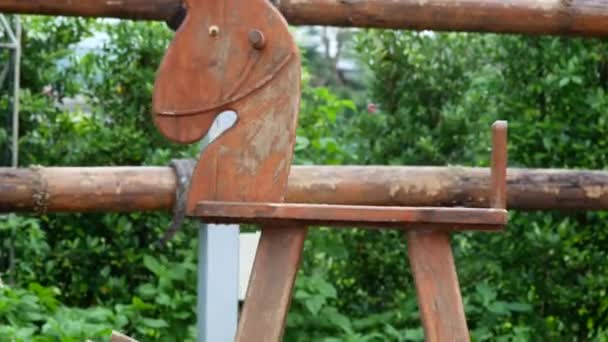 Wooden Rocking Horse Moving Park Outdoors — Stock Video