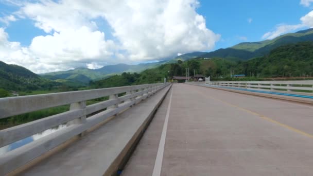 Moving Scenery Seen While Riding Bycycle Bridge River Mountains Bright — Stock Video