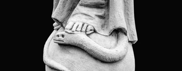 The Virgin Mary crushes the head of the snake. The concept of good and evil