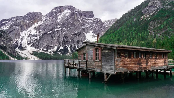 Beautiful landscape with mountain lake view. Bries Lake Hut at the Dolomites in Italy — Stock Photo, Image