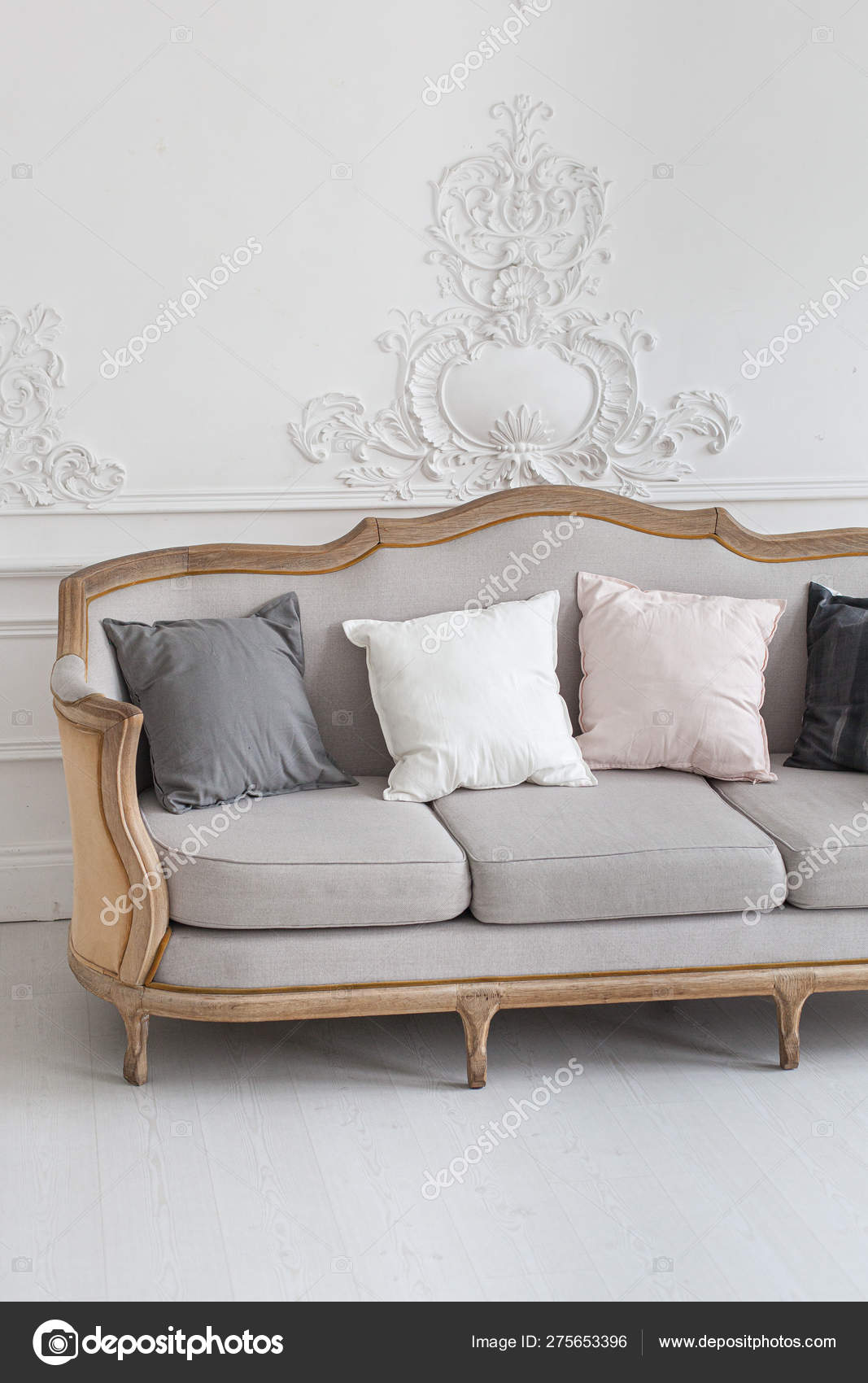 Luxurious Bright Rococo Interior With A Large Sofa And