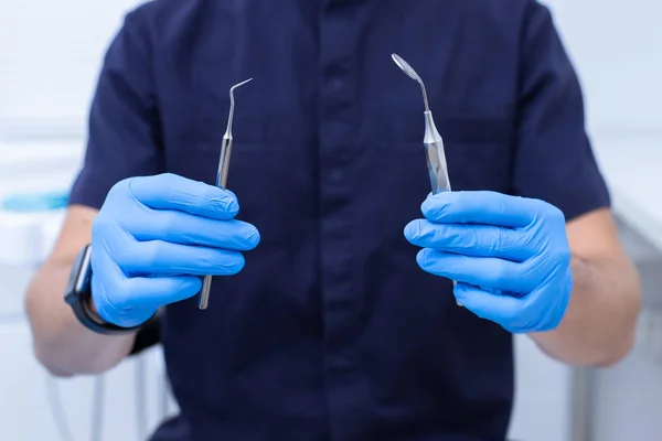 Dental polymerization lamp with UV light and laser. Stomatological instrument in the dentist clinic. Medicine, health, stomatology concept. — Stock Photo, Image