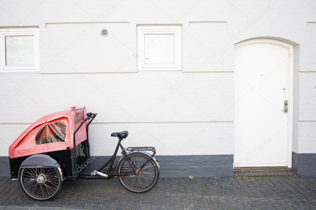 rickshaw bike parked in front of the house,Svaneke,Bornholm