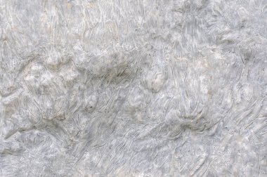 Arka plan için gri beton duvarın pürüzlü yüzeyi