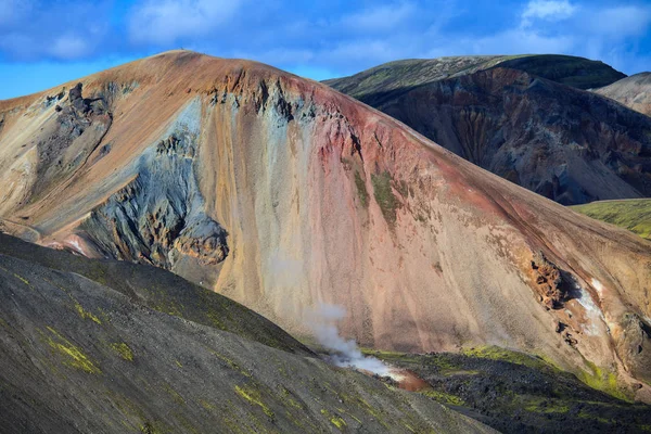 Beautiful colorful volcanic mountains Landmannalaugar in Iceland, summer time and sunny day. Magnificent and unforgettable Iceland. Northern Europe