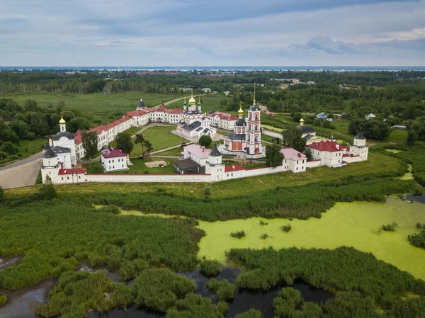 Aerial summer view of white old monastery with golden domes among green fields in Rostov the Great city. Russia — Stock Photo, Image