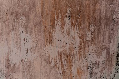 Güneş boyalı yüzeyinde yanmış yırtık eski bir demir yaprağı arka plan