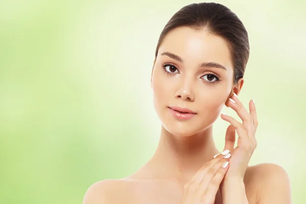 Portrait of a beautiful young woman, skin care and hands with ma — Stock Photo, Image