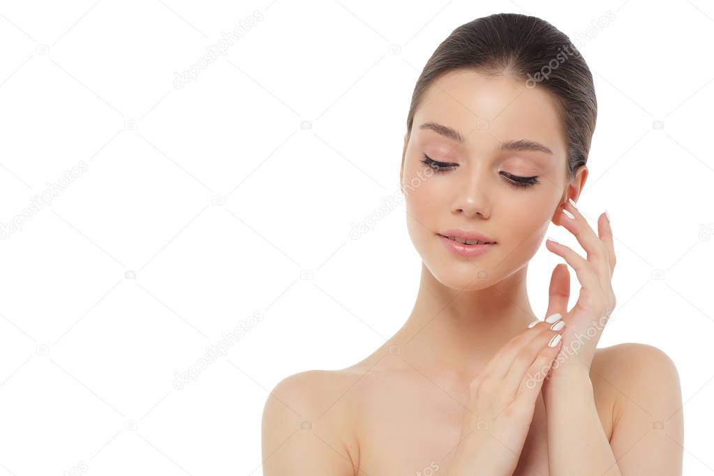 Portrait of a beautiful young woman, skin care and hands with ma