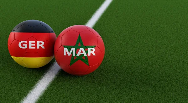 Germany vs. Morocco Soccer Match - Soccer balls in German and Morocco national colors on a soccer field. Copy space on the right side - 3D Rendering