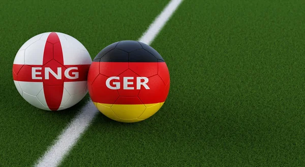 Germany vs. England Soccer Match - Soccer balls in Germanys and Englands national colors on a soccer field. Copy space on the right side - 3D Rendering