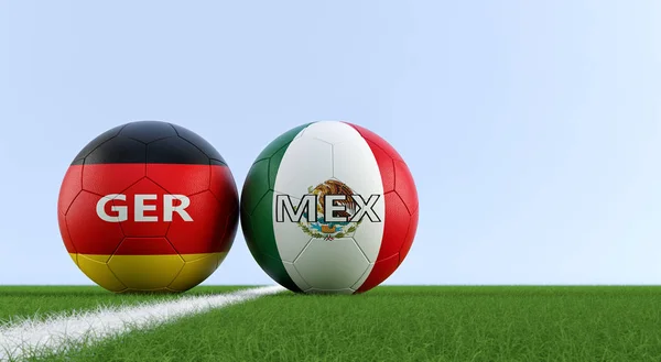 Germany vs. Mexico Soccer Match - Soccer balls in Germanys and Mexicos national colors on a soccer field. Copy space on the right side - 3D Rendering