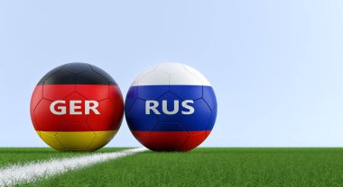 Almanya vs Rusya Futbol Maç - futbol topları bir futbol sahası üzerinde ulusal renklerde Almanca ve Rusya. Alanı sağ tarafındaki Kopyala - 3d render 