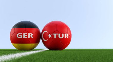 Türkiye vs Almanya futbol maç - futbol topları bir futbol sahası üzerinde ulusal renklerde Türkiye ve Almanya. Alanı sağ tarafındaki Kopyala - 3d render 