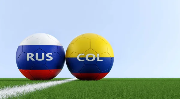 コロンビア対ロシア サッカー サッカーのフィールド上のコロンビア ロシア国旗の色でのサッカー ボール 右側のスペースをコピー レンダリング — ストック写真