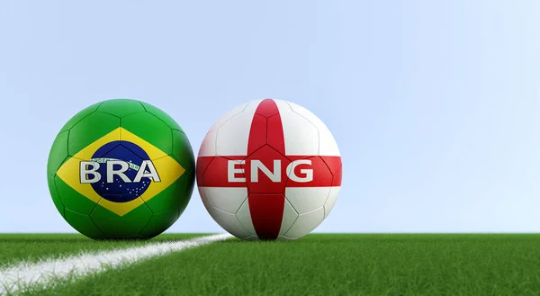 Brazil vs. England Soccer Match - Soccer balls in Brazil and England national colors on a soccer field. Copy space on the right side - 3D Rendering